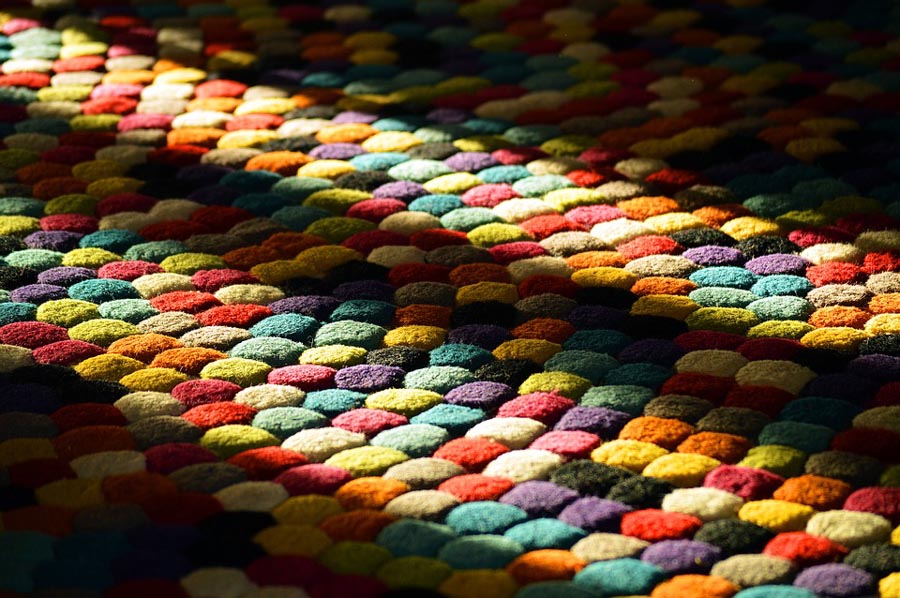 decorar y aislar alfombras tapices cojines
